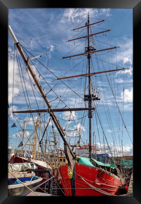 Red Sails Boldly Reflect in Penzance Harbour Framed Print by Roger Mechan