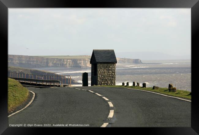 Bus Shelter with a view. Framed Print by Glyn Evans