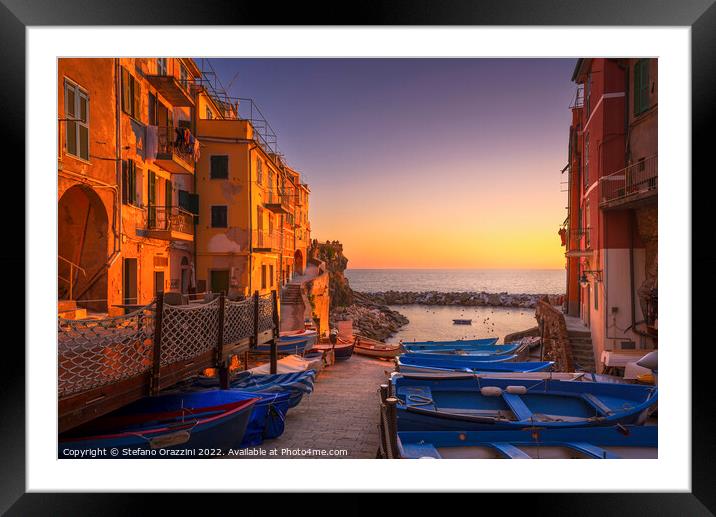 Riomaggiore boats in the street at sunset. Cinque Terre Framed Mounted Print by Stefano Orazzini