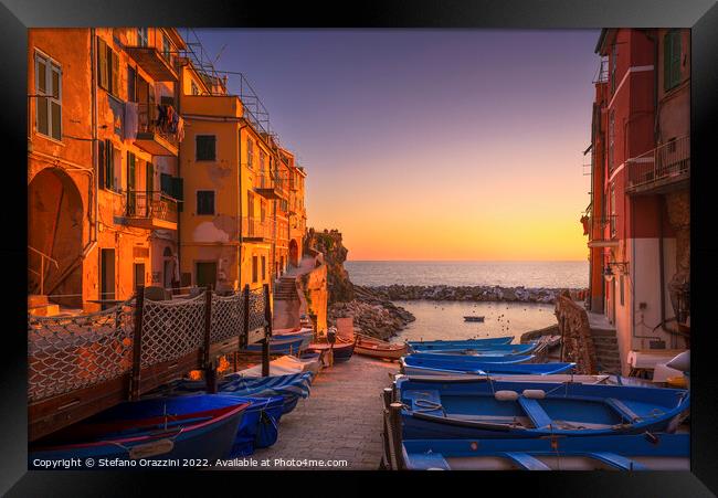 Riomaggiore boats in the street at sunset. Cinque Terre Framed Print by Stefano Orazzini