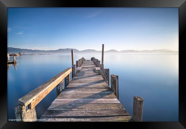 Wooden jetty and lake at sunrise. Torre del Lago Puccini Framed Print by Stefano Orazzini