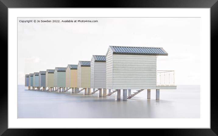 Receding beach huts, Osea  Framed Mounted Print by Jo Sowden