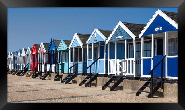 Colourful Beach Huts on Southwold Beach Framed Print by Kevin Snelling