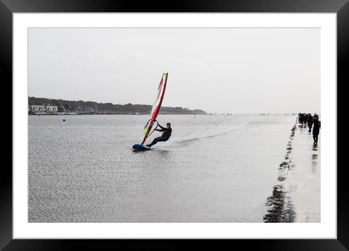 Wind surfer on West Kirby lake Framed Mounted Print by Jason Wells