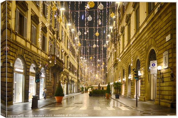 Christmas decorations Via Dei Tornabuoni in Floren Canvas Print by Angela Wallace