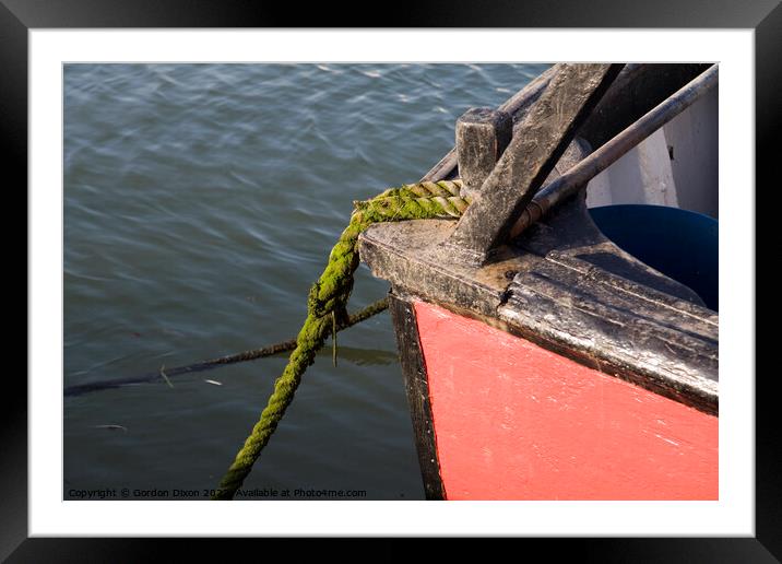 Bow of an old red trawler moored in Weymouth harbour Framed Mounted Print by Gordon Dixon