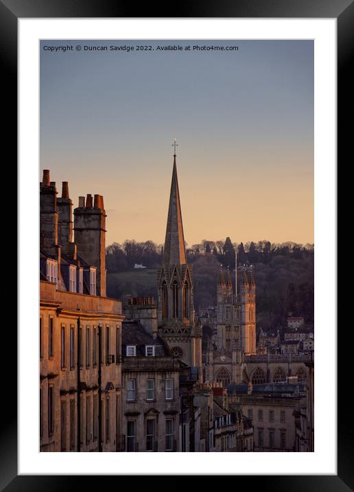 Winter sun hitting the Bath Abbey and surrounding sky line Framed Mounted Print by Duncan Savidge
