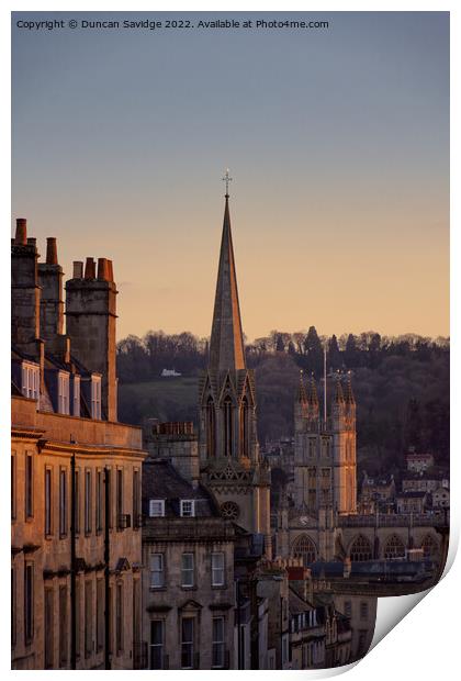 Winter sun hitting the Bath Abbey and surrounding sky line Print by Duncan Savidge
