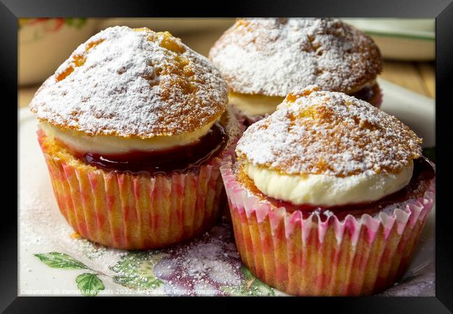 Three Cupcakes on a side plate Framed Print by Pamela Reynolds