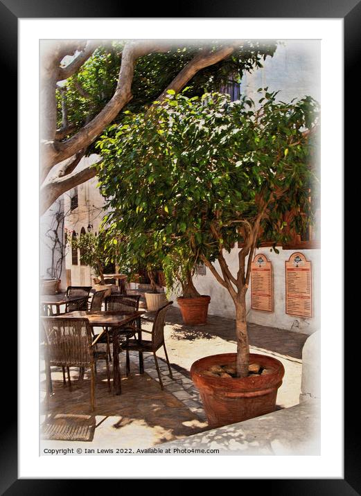A Shaded Table in Mojácar Framed Mounted Print by Ian Lewis