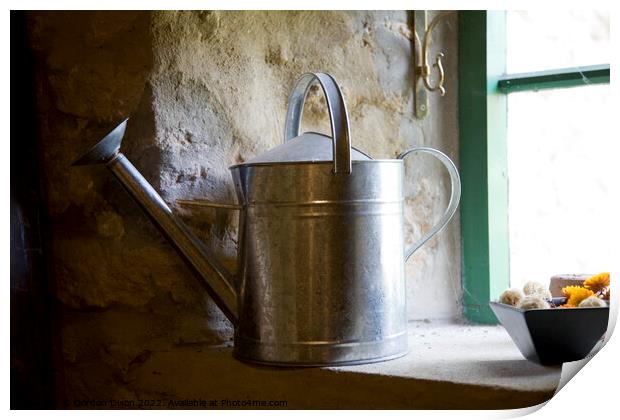 A galvanised watering can sits on a windowsill Print by Gordon Dixon
