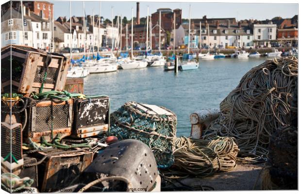 Weymouth Harbour with lobster pots Canvas Print by Gordon Dixon