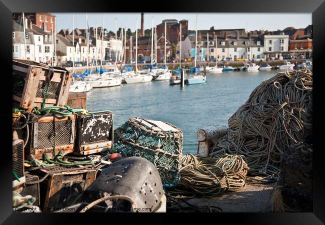 Weymouth Harbour with lobster pots Framed Print by Gordon Dixon