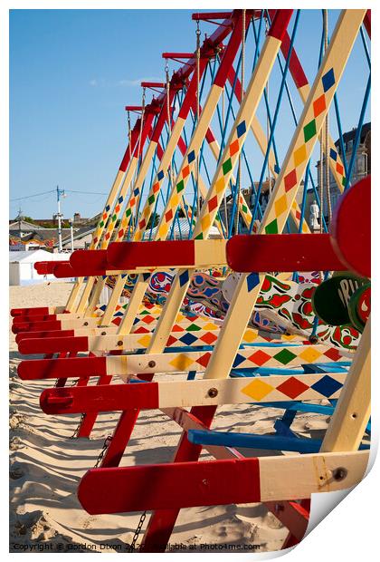 Colourful swing boats on the beach at Weymouth  Print by Gordon Dixon