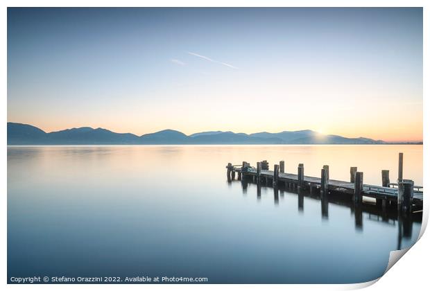 Wooden pier at sunrise. Lake Massaciuccoli Print by Stefano Orazzini