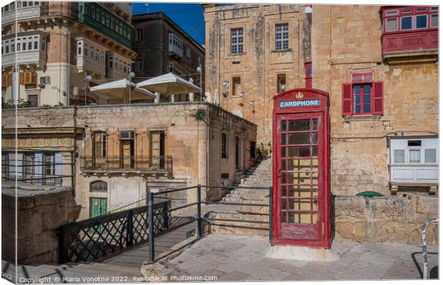 Red telephone booth in Valletta Malta.  Canvas Print by Maria Vonotna