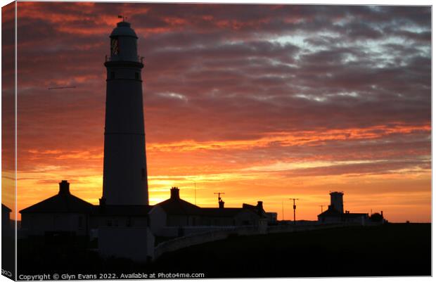 Sunset at Nash Point Lighthouse. Canvas Print by Glyn Evans