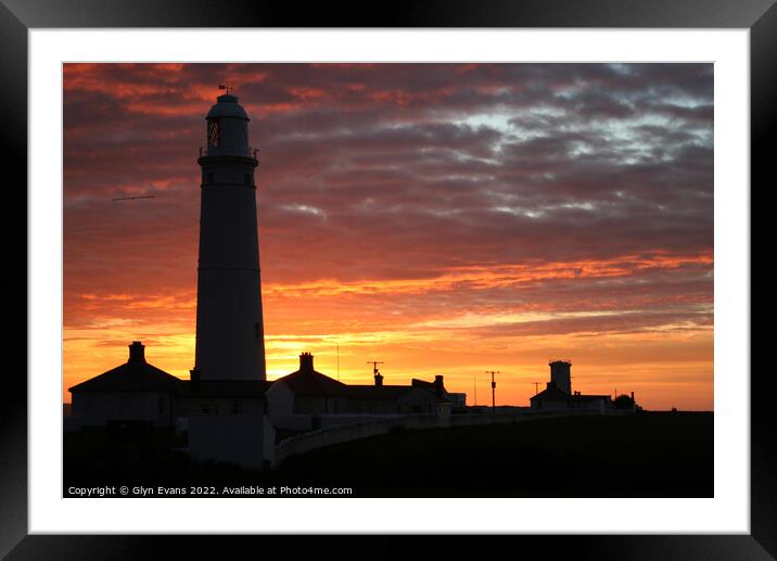 Sunset at Nash Point Lighthouse. Framed Mounted Print by Glyn Evans