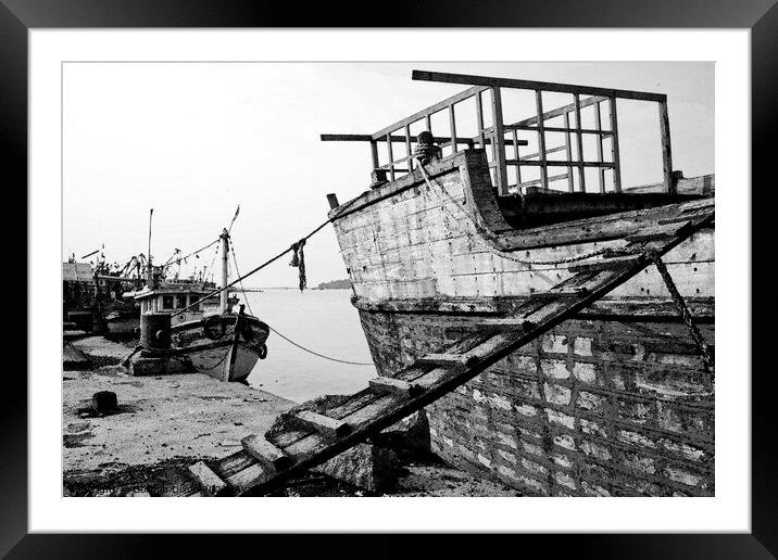 Wooden ship undergoing repairs in Mangalore - watercolour conversion of B&W image Framed Mounted Print by Gordon Dixon