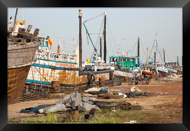 Cargo ships lined up along the quay - Mangalore, India Framed Print by Gordon Dixon