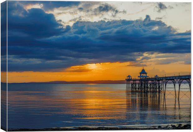 Clevedon Pier at sunset on a calm and cloud evening Canvas Print by Rory Hailes