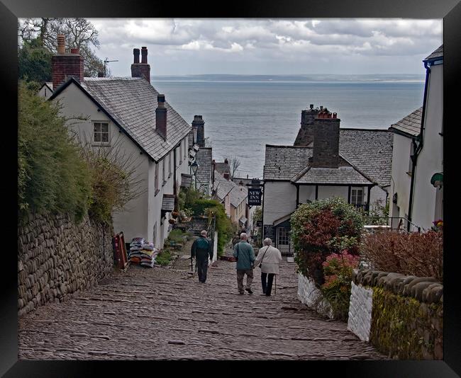 Clovelly Framed Print by Geoff Storey