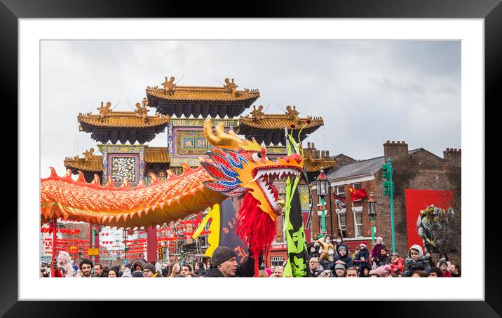 Dragon Dance passes the paifang Framed Mounted Print by Jason Wells