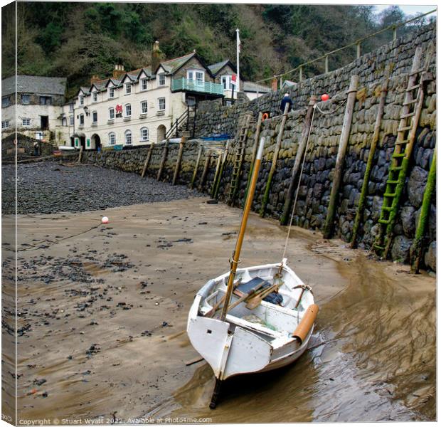 Clovelly Harbour Wall and Fishing Boat Canvas Print by Stuart Wyatt