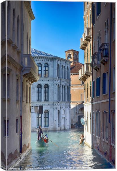 Gondola on Venice canal Canvas Print by Angela Wallace