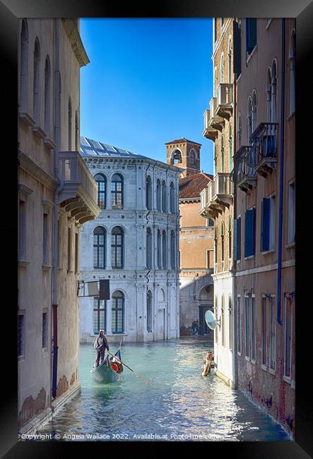 Gondola on Venice canal Framed Print by Angela Wallace