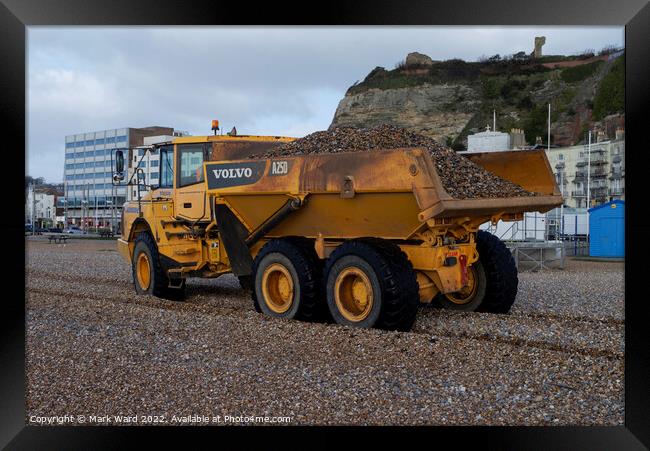 Volvo Dump Truck in Action in Hastings. Framed Print by Mark Ward