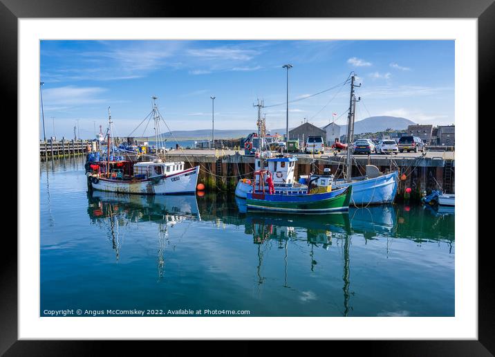 Fishing boats in Stromness harbour, Orkney Isles Framed Mounted Print by Angus McComiskey