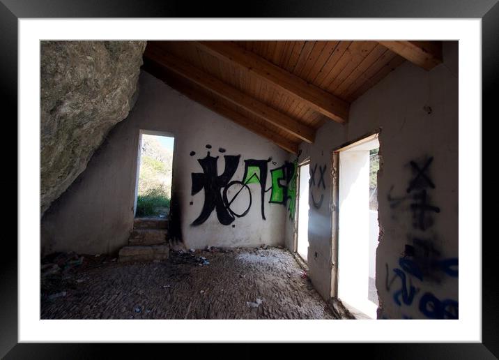 Interior of a derelict house, integrated in the rocks, with graffiti in Setenil Framed Mounted Print by Jose Manuel Espigares Garc