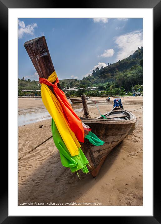 Long tail boat with colourful prow ribbons  Framed Mounted Print by Kevin Hellon