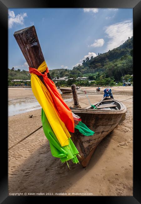 Long tail boat with colourful prow ribbons  Framed Print by Kevin Hellon