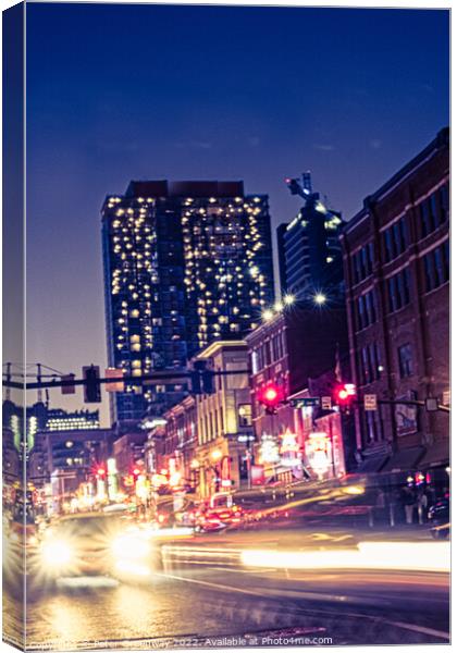 Downtown Nashville, Tennessee On A Saturday Night Canvas Print by Peter Greenway