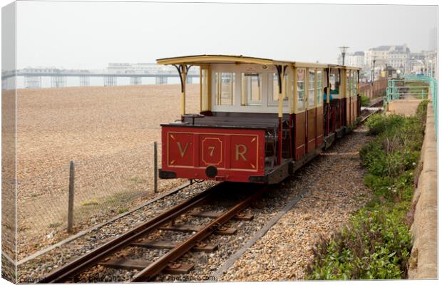 The Volks narrow gauge electric railway on Brighton beach  Canvas Print by Gordon Dixon