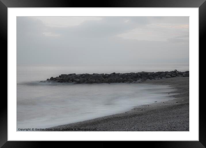 Incoming tide at West Bay Framed Mounted Print by Gordon Dixon