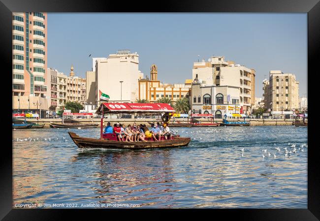 Crossing the Dubai Creek  Framed Print by Jim Monk