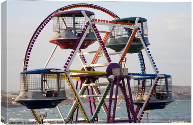 Childrens Ferris Wheel on Weymouth promenade Canvas Print by Gordon Dixon