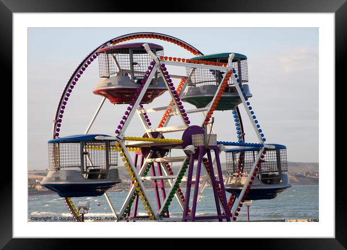 Childrens Ferris Wheel on Weymouth promenade Framed Mounted Print by Gordon Dixon