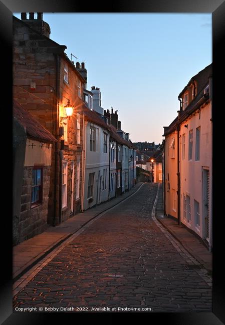 The Cobbled street of Whitby Framed Print by Bobby De'ath
