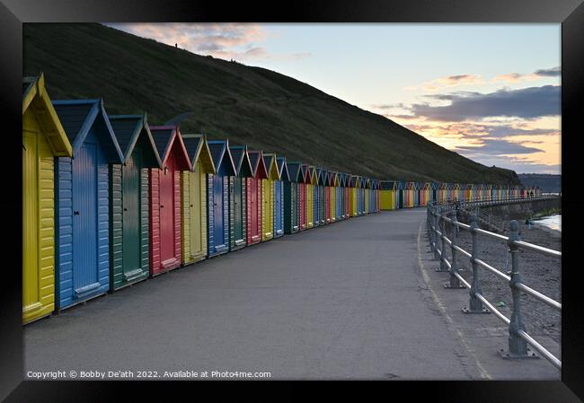 Beach huts of Whitby Framed Print by Bobby De'ath