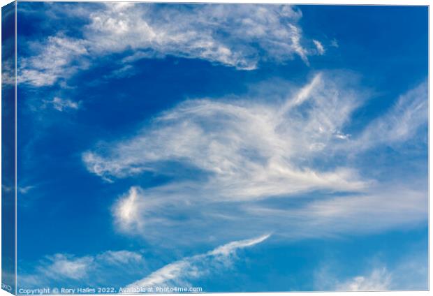 Cirrus clouds against a blue sky Canvas Print by Rory Hailes