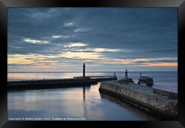Whitby piers in the evening light Framed Print by Bobby De'ath