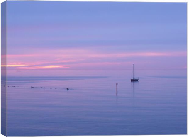 Dawn in Newbiggin by the Sea Canvas Print by Richard Dixon