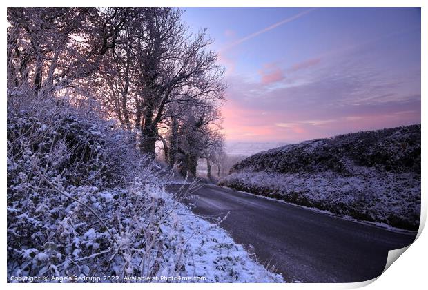 A quiet country road on a snowy morning with a colourful sinrise Print by Angela Redrupp