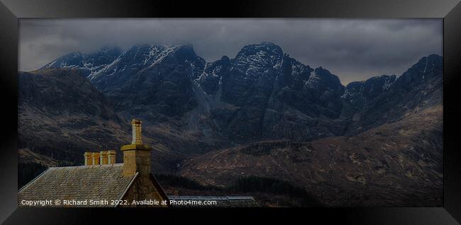 The roof and chimneys of the Torrin Outdoor Centre set against Blaven.  Framed Print by Richard Smith
