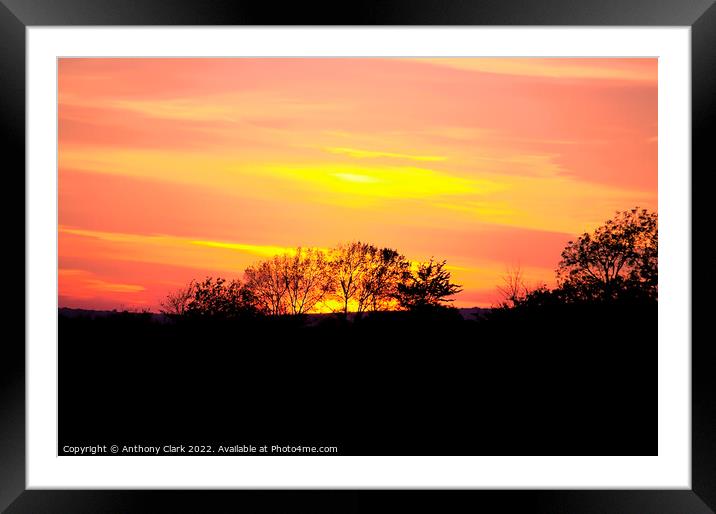 Fire in the sky Framed Mounted Print by Anthony Clark