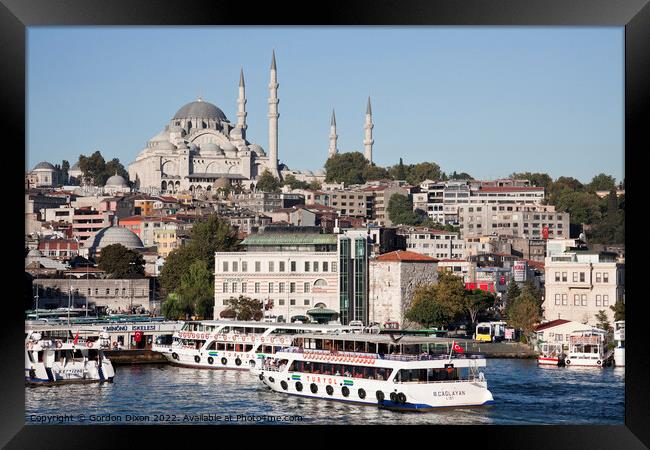 Magnificent Suleymaniye Mosque towers over the Eminonu waterfront - Istanbul Framed Print by Gordon Dixon